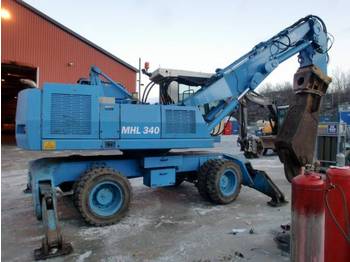 Fuchs 340 w/shears and magnet - Construction machinery
