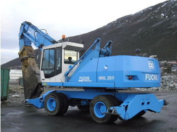 Fuchs MHL 350 with shears and magnet - Construction machinery