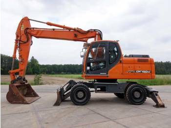 Wheel excavator Doosan DX190W (INCL. BLADE + OUTRIGGERS)