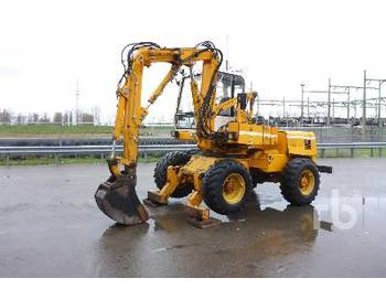 MECALAC 11CXI - Wheel excavator