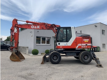 O&K MH 5 Compact - Wheel excavator
