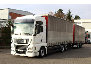 Curtain side truck MAN TGX 26.500