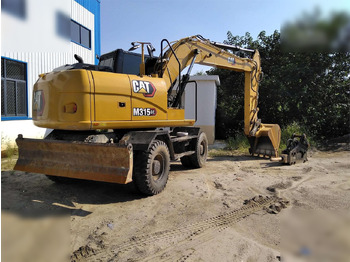 Wheel excavator CATERPILLAR M315