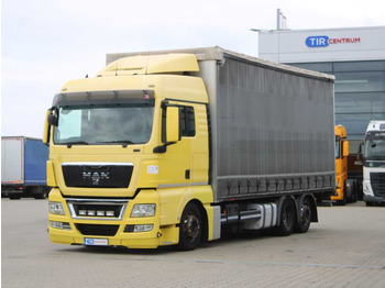 Curtain side truck MAN TGX 24.440