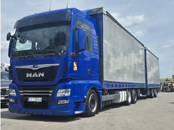 Curtain side truck MAN TGX 24.500