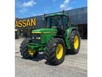 Farm tractor JOHN DEERE 6810