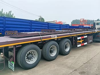 New Dropside/ Flatbed semi-trailer for transportation of containers TITAN Semi Truck Flatbed Traile for Sale in Saudi Arabia: picture 2