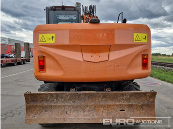 Wheel excavator Hitachi ZX140W-3: picture 4