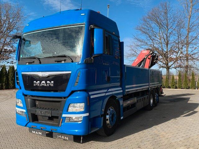 Crane truck MAN TGX 26.440 Volluft 6x2 Pritsche Kran FASSI F215: picture 1