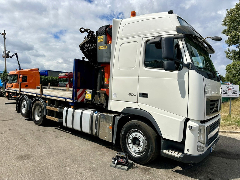 Volvo FH 500 6X2 PRITSCHE + KRAN PALFINGER PK50002 E 6x - RETARDER - PLATFORM 6m20 - TWISTLOCKS 20' - 561.000km - EURO 5 - Dropside/ Flatbed truck, Crane truck: picture 1 Volvo FH 500 6X2 PRITSCHE + KRAN PALFINGER PK50002 E 6x - RETARDER - PLATFORM 6m20 - TWISTLOCKS 20' - 561.000km - EURO 5 - Dropside/ Flatbed truck, Crane truck: picture 1