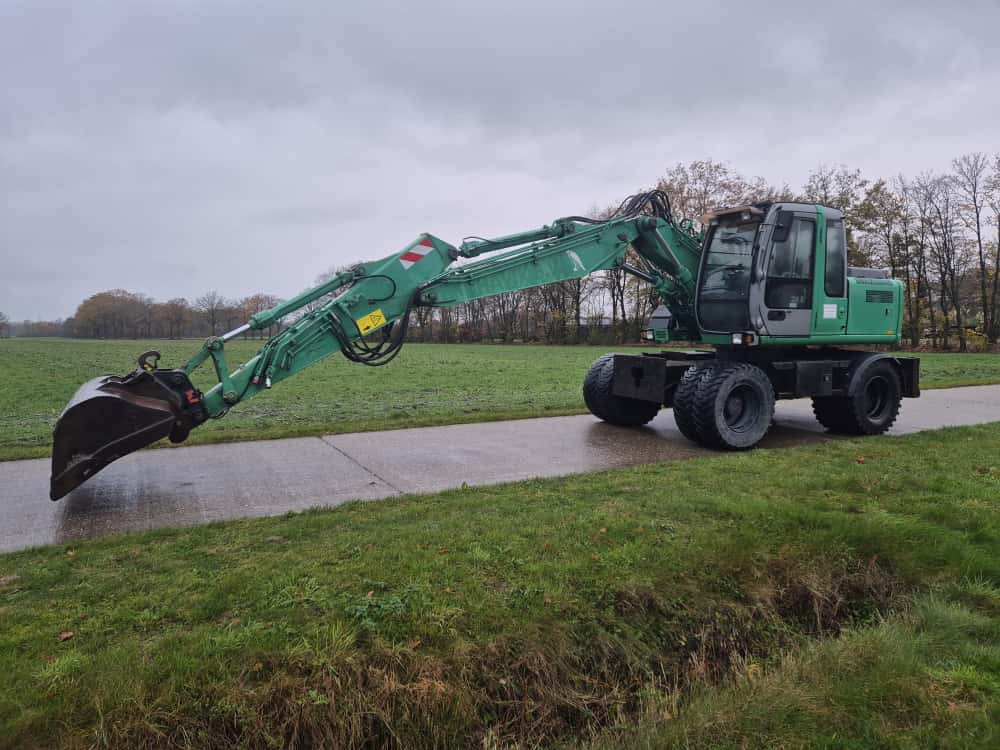 Wheel excavator HITACHI ZX 130 W: picture 11