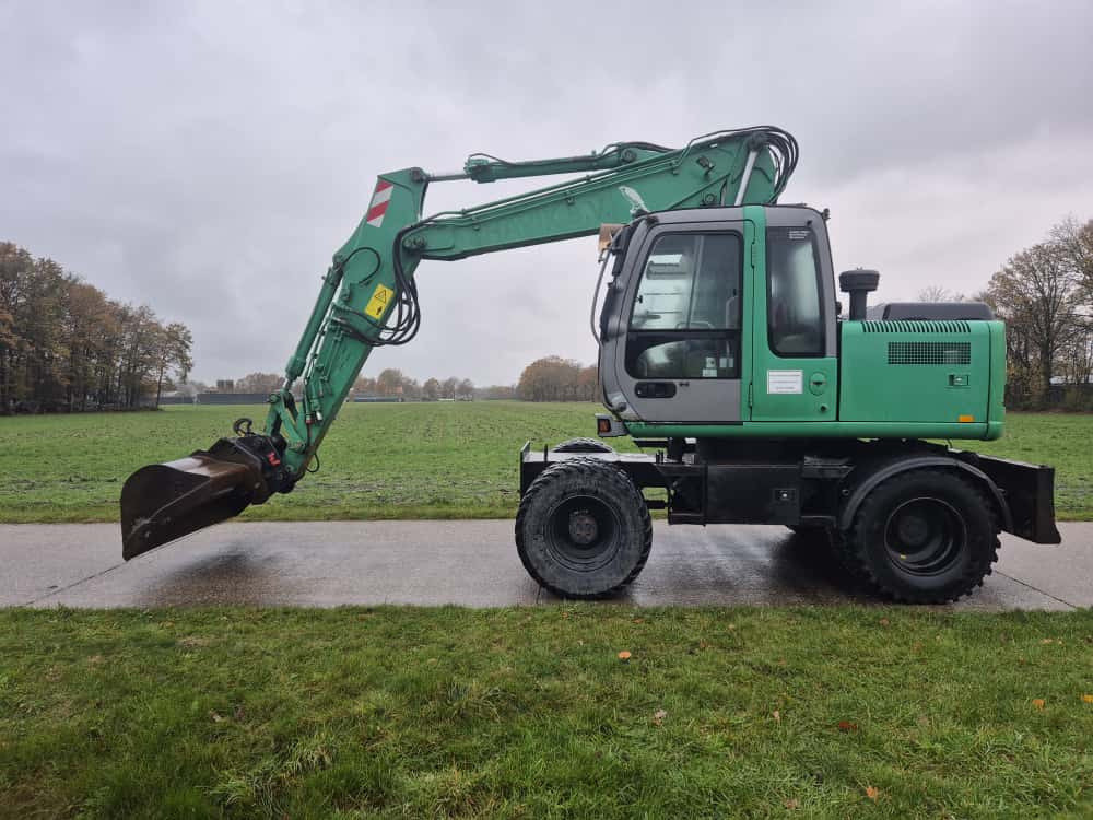 Wheel excavator HITACHI ZX 130 W: picture 8