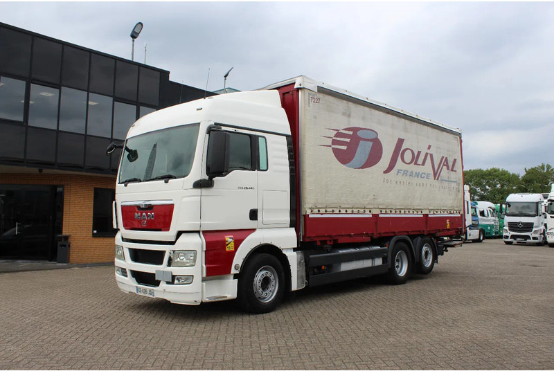MAN TGX 26.440 * EURO5 * 6X2 * LIFT AXLE * - Curtain side truck: picture 1 MAN TGX 26.440 * EURO5 * 6X2 * LIFT AXLE * - Curtain side truck: picture 1