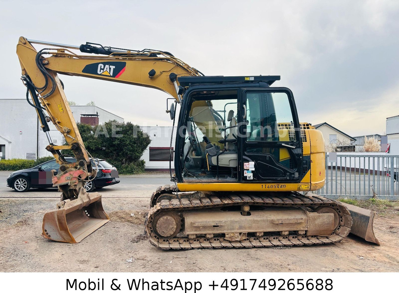 CAT 311D *6600Std./Schnellwechsler/Schaufel/Klima - Crawler excavator: picture 3 CAT 311D *6600Std./Schnellwechsler/Schaufel/Klima - Crawler excavator: picture 3
