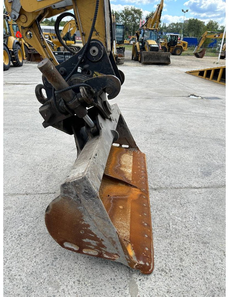 Wheel excavator CAT M318F: picture 21