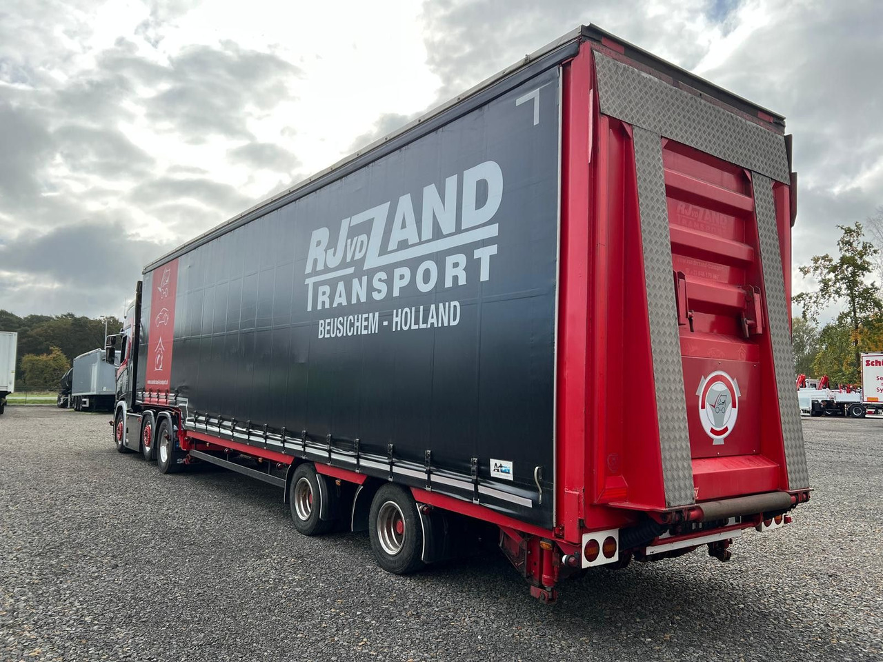 Meusburger 2-Achs-Gabelstaplertransporter Rampe Dhollandia - Curtainsider semi-trailer: picture 2 Meusburger 2-Achs-Gabelstaplertransporter Rampe Dhollandia - Curtainsider semi-trailer: picture 2