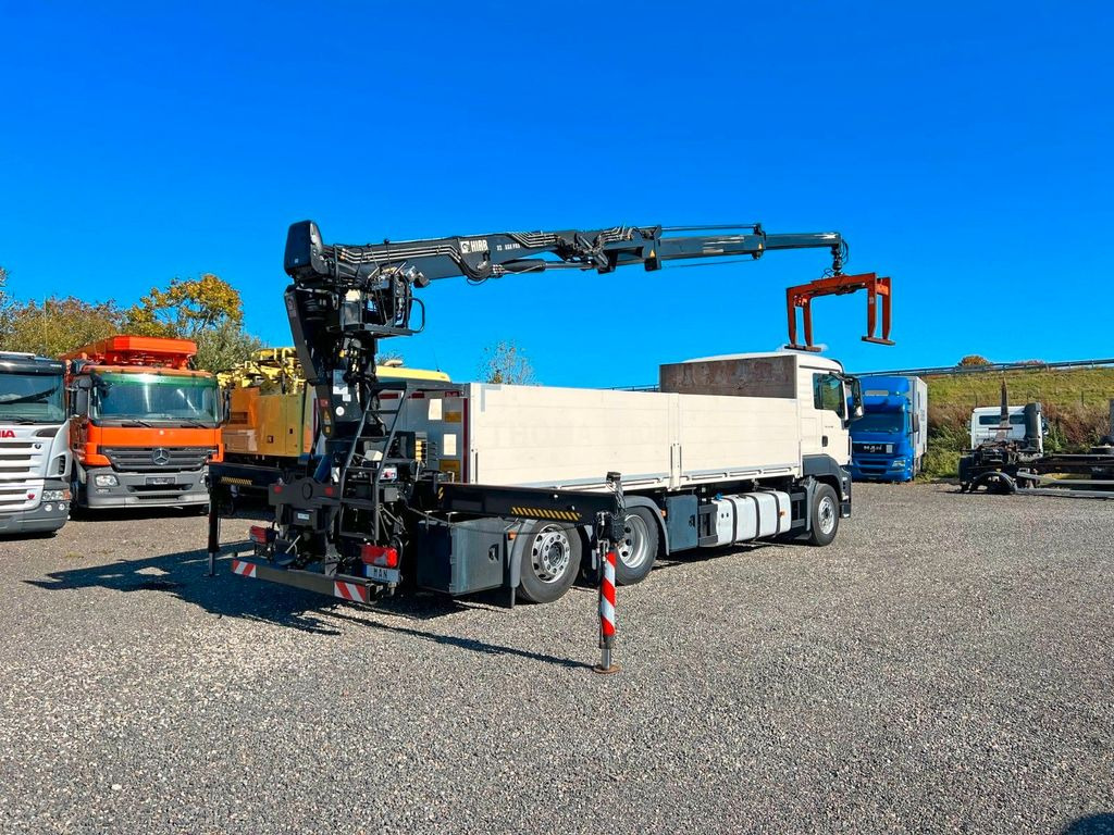 MAN 26.480 6X2 Baustoff mit Kran HIAB Top Zustand - Crane truck, Dropside/ Flatbed truck: picture 1 MAN 26.480 6X2 Baustoff mit Kran HIAB Top Zustand - Crane truck, Dropside/ Flatbed truck: picture 1