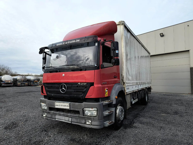Mercedes-Benz Axor 1829 + D'HOLLANDIA 2000 KG - Curtain side truck: picture 1 Mercedes-Benz Axor 1829 + D'HOLLANDIA 2000 KG - Curtain side truck: picture 1