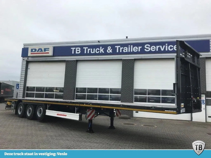 Kässbohrer SPA X 3 / 1N - 18 / 27 Uitschuifbare vlakke oplegger - Dropside/ Flatbed semi-trailer: picture 1 Kässbohrer SPA X 3 / 1N - 18 / 27 Uitschuifbare vlakke oplegger - Dropside/ Flatbed semi-trailer: picture 1