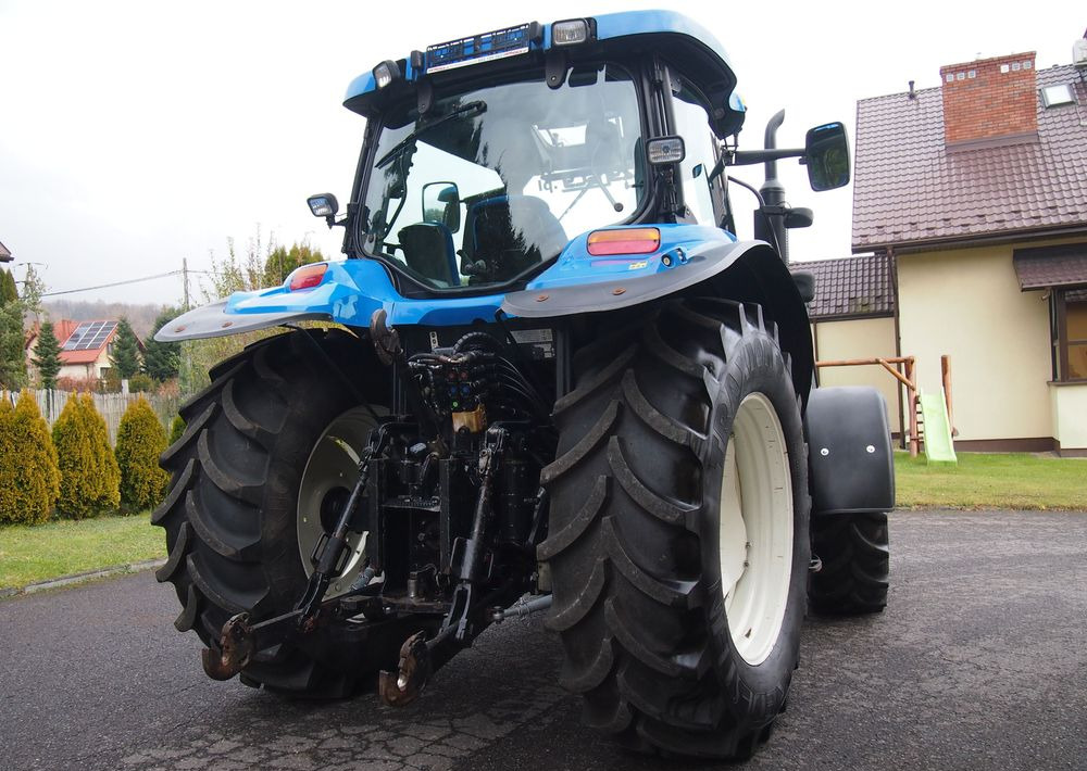 Ciągnik New Holland NH TS125A 6 cylindrów 2004 Ciągnik rolniczy New Holland TS125A - Farm tractor: picture 5 Ciągnik New Holland NH TS125A 6 cylindrów 2004 Ciągnik rolniczy New Holland TS125A - Farm tractor: picture 5