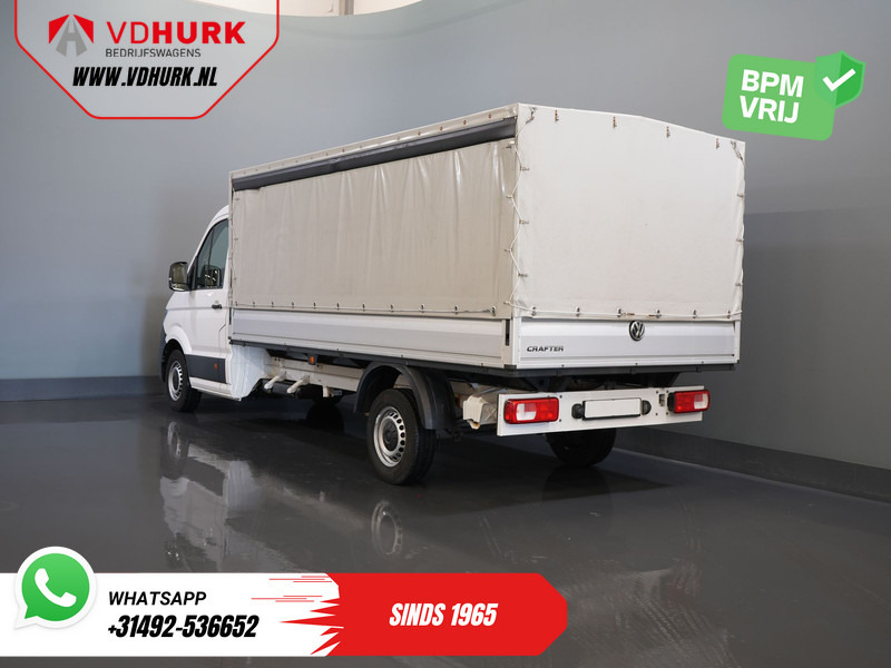 Volkswagen Crafter 35 2.0 TDI 180 pk DSG Aut. BPM VRIJ! 430x203 Open laadbak/ Schuifzeil/ Huif/ Climate/ Adapt. Cruise/ Camera/ Carplay - Open body delivery van: picture 2 Volkswagen Crafter 35 2.0 TDI 180 pk DSG Aut. BPM VRIJ! 430x203 Open laadbak/ Schuifzeil/ Huif/ Climate/ Adapt. Cruise/ Camera/ Carplay - Open body delivery van: picture 2