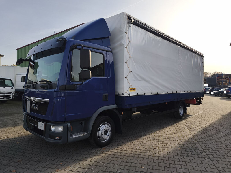 MAN TGL 8.220 4x2 Euro 6 LBW AHK (19) - Curtain side truck: picture 1 MAN TGL 8.220 4x2 Euro 6 LBW AHK (19) - Curtain side truck: picture 1