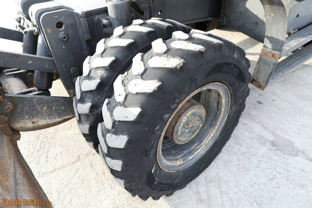 Wheel excavator New Holland MH 6.6 + Sandvic Hammer: picture 11