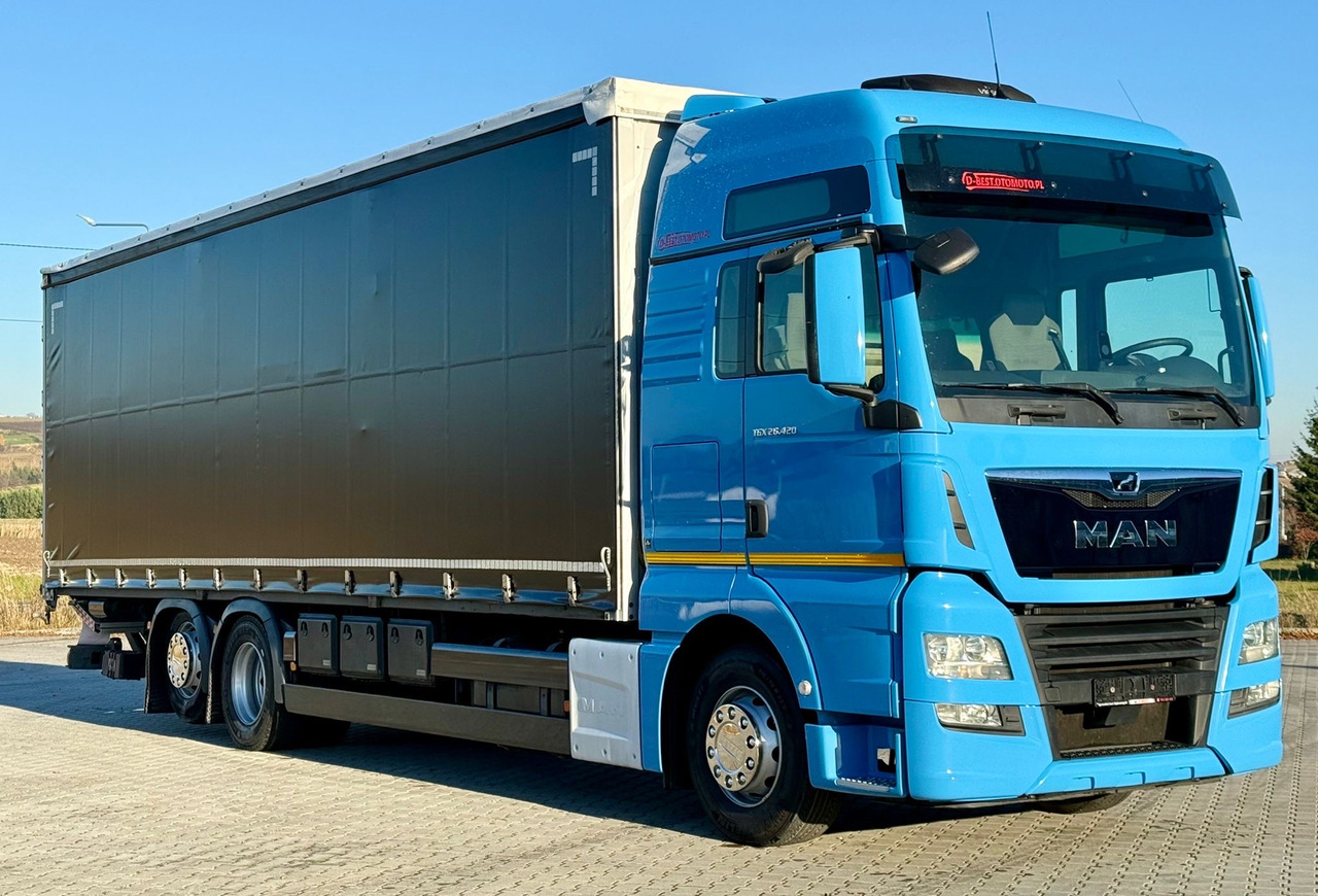 MAN TGX 26.420 / FIRANKA / WINDA / 23 EUROPALETY / 6x2 / AUTOMAT / EURO 6 / OŚ PODNOSZONA / DUŻA KABINA / 2019 ROK - Curtain side truck: picture 1 MAN TGX 26.420 / FIRANKA / WINDA / 23 EUROPALETY / 6x2 / AUTOMAT / EURO 6 / OŚ PODNOSZONA / DUŻA KABINA / 2019 ROK - Curtain side truck: picture 1