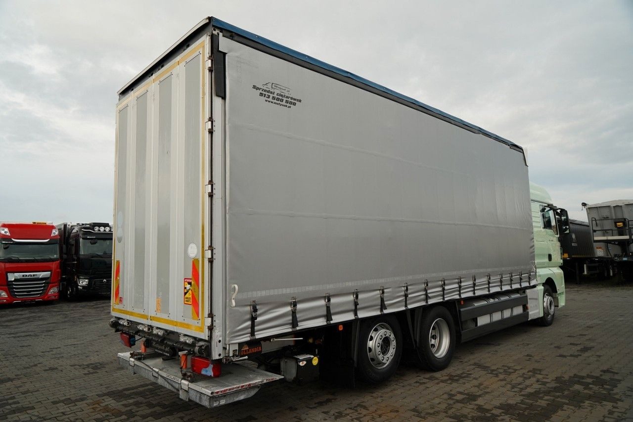 MAN TGX 26.440 / 6x2 / FIRANKA - 8,15 m / SOLÓWKA / MAN TGX 26.440 / 6x2 / FIRANKA - 8,15 m / SOLÓWKA / - Curtain side truck: picture 4 MAN TGX 26.440 / 6x2 / FIRANKA - 8,15 m / SOLÓWKA / MAN TGX 26.440 / 6x2 / FIRANKA - 8,15 m / SOLÓWKA / - Curtain side truck: picture 4