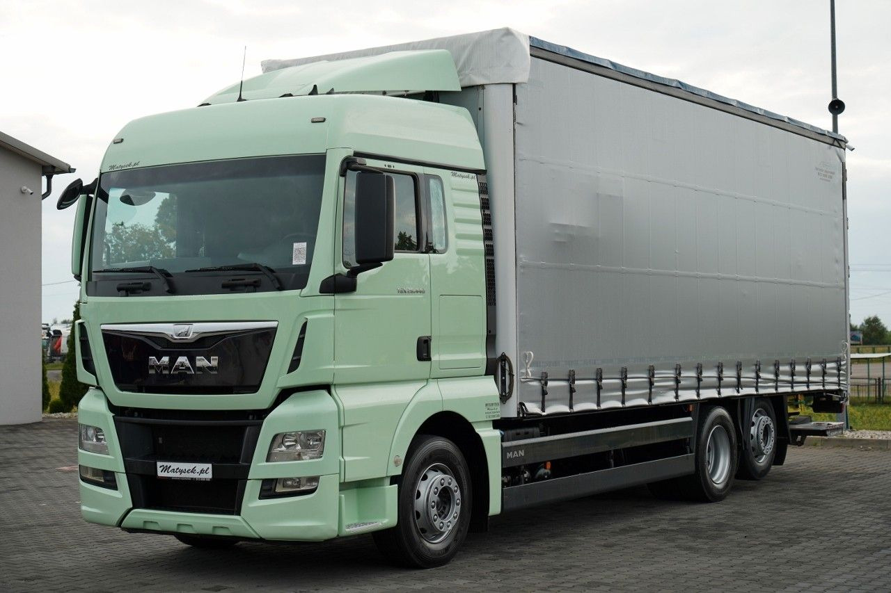 MAN TGX 26.440 / 6x2 / FIRANKA - 8,15 m / SOLÓWKA / MAN TGX 26.440 / 6x2 / FIRANKA - 8,15 m / SOLÓWKA / - Curtain side truck: picture 2 MAN TGX 26.440 / 6x2 / FIRANKA - 8,15 m / SOLÓWKA / MAN TGX 26.440 / 6x2 / FIRANKA - 8,15 m / SOLÓWKA / - Curtain side truck: picture 2