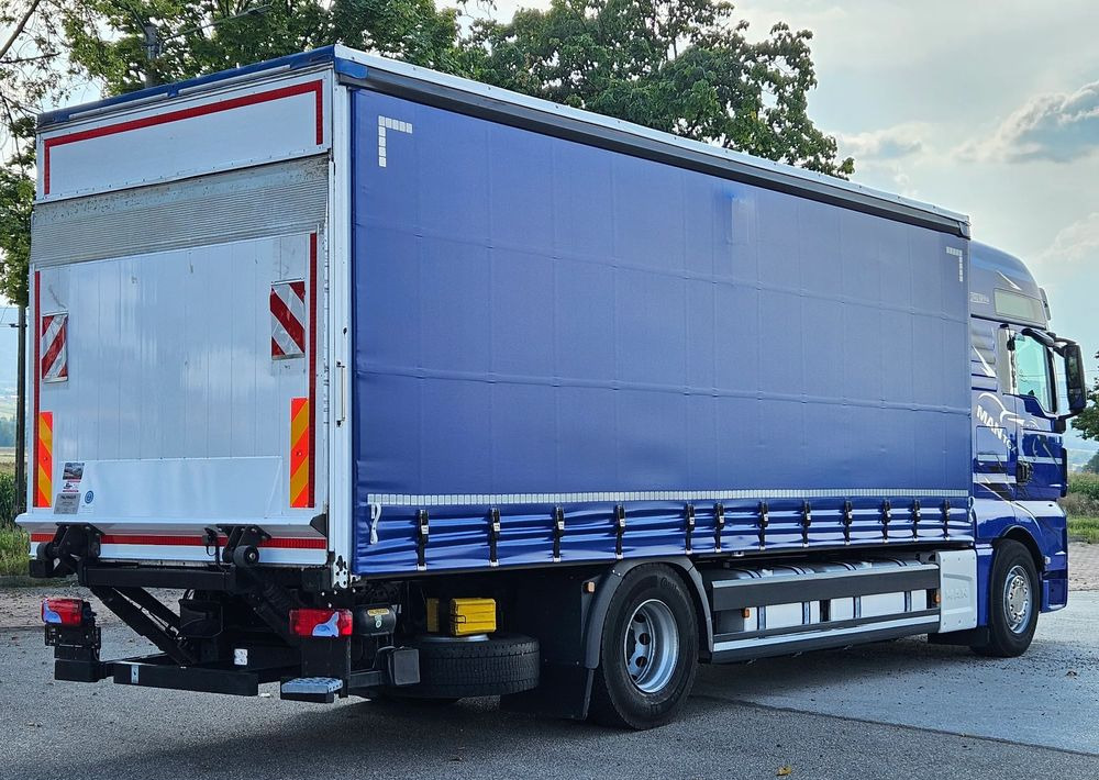 MAN TGX 18.430 / FIRANKA / WINDA / KLIMA POSTOJOWA / 300TYŚ PRZEBIEG / 2020 /E6 / KLIMA POSTOJOWA / SPROWADZONY / JAK NOWY / AUTOMAT - Curtain side truck: picture 4 MAN TGX 18.430 / FIRANKA / WINDA / KLIMA POSTOJOWA / 300TYŚ PRZEBIEG / 2020 /E6 / KLIMA POSTOJOWA / SPROWADZONY / JAK NOWY / AUTOMAT - Curtain side truck: picture 4