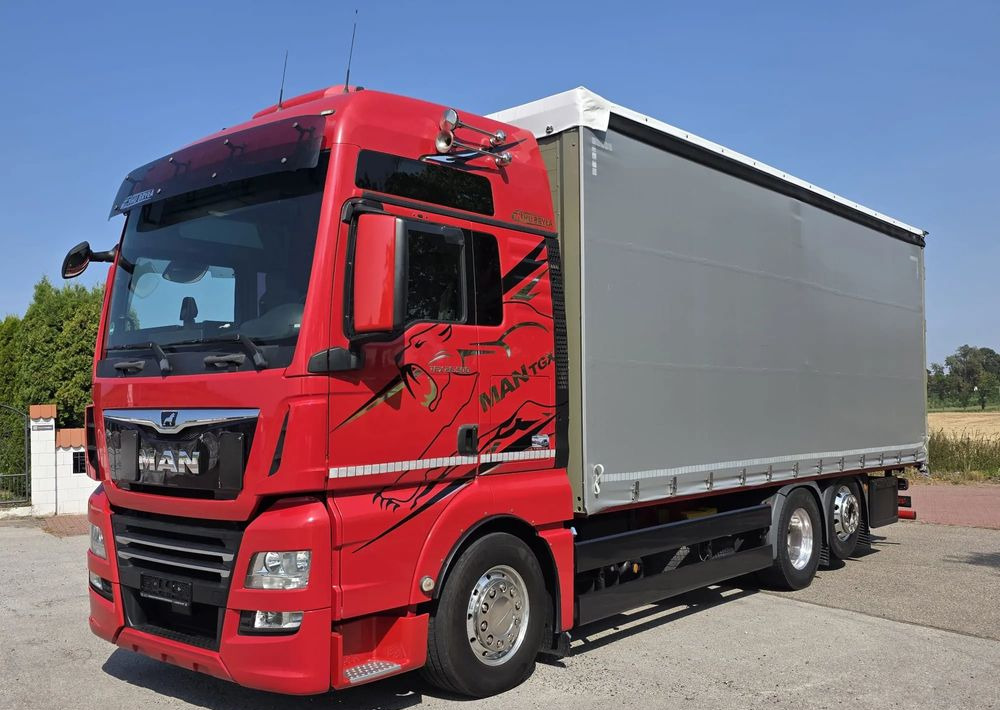 MAN TGX 26.500 / ALUMINIOWE FELGI / LIFT / 6X2 / KLIMA POSTOJOWA / 18PALET / E6 / FIRANKA / 17 TON ŁADOWNOŚĆ / WINDA / NISKI PRZEBIEG / JEDEN WŁAŚCICIEL / PODWIESZANA OŚ - Curtain side truck: picture 1 MAN TGX 26.500 / ALUMINIOWE FELGI / LIFT / 6X2 / KLIMA POSTOJOWA / 18PALET / E6 / FIRANKA / 17 TON ŁADOWNOŚĆ / WINDA / NISKI PRZEBIEG / JEDEN WŁAŚCICIEL / PODWIESZANA OŚ - Curtain side truck: picture 1