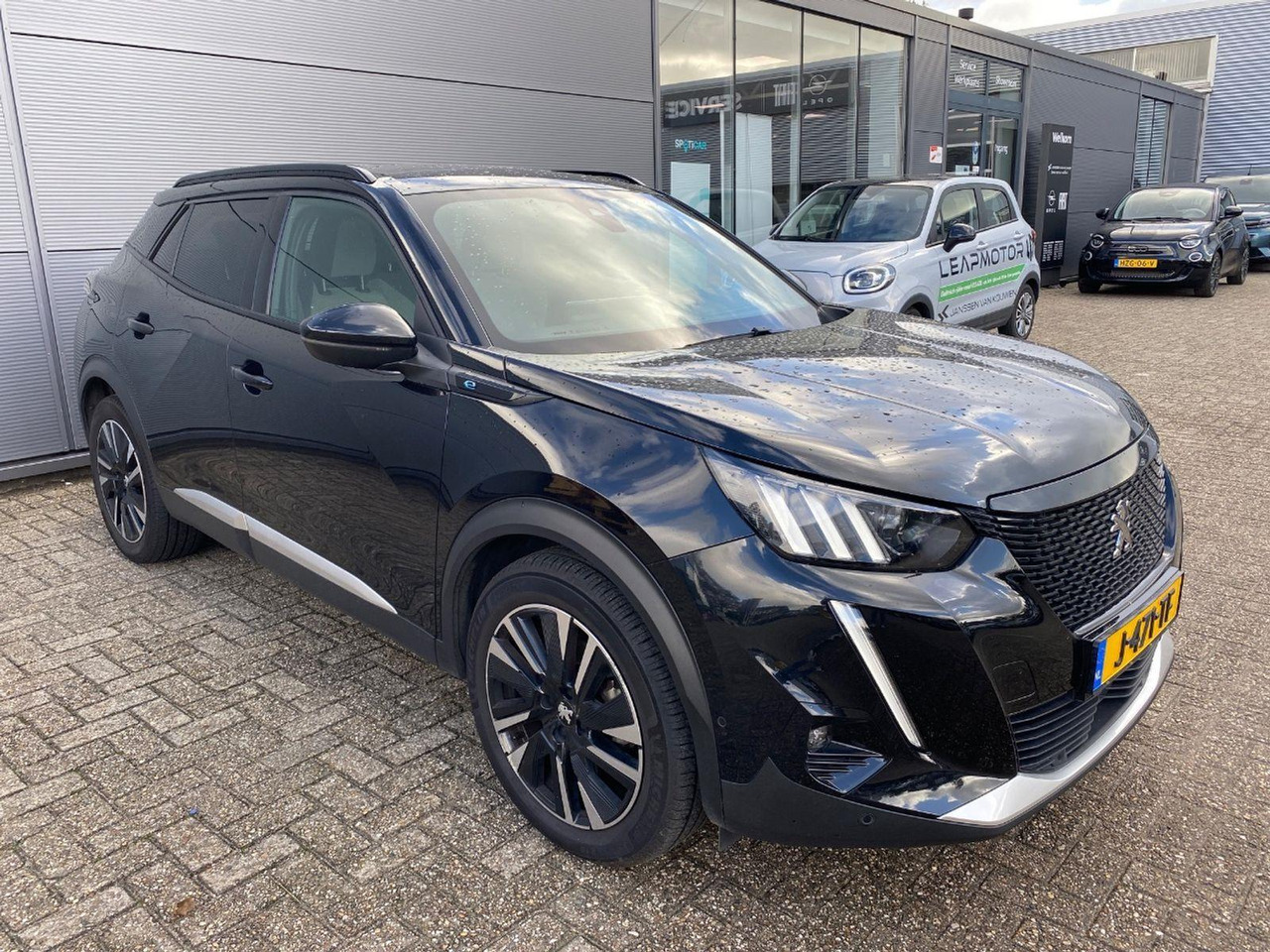 Peugeot e-2008 EV GT Première 1 fase 50 kWh | 2020 | 121.940 km | Automaat | J471TF | NAP: Logisch - SUV: picture 2 Peugeot e-2008 EV GT Première 1 fase 50 kWh | 2020 | 121.940 km | Automaat | J471TF | NAP: Logisch - SUV: picture 2