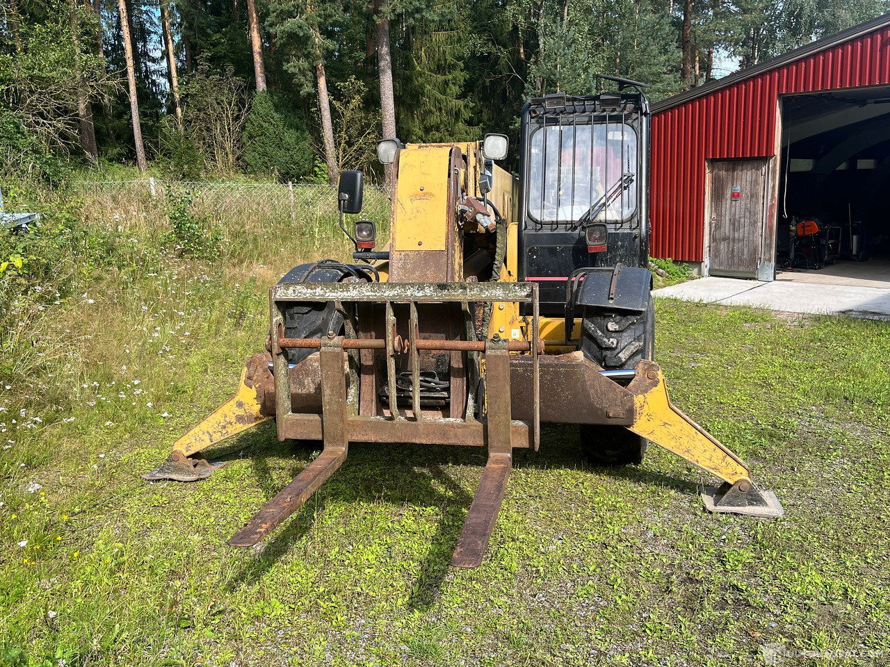 Caterpillar TH63, kurottaja piikeillä ja kauhalla, 2002, Loppi - Agricultural machinery: picture 4 Caterpillar TH63, kurottaja piikeillä ja kauhalla, 2002, Loppi - Agricultural machinery: picture 4