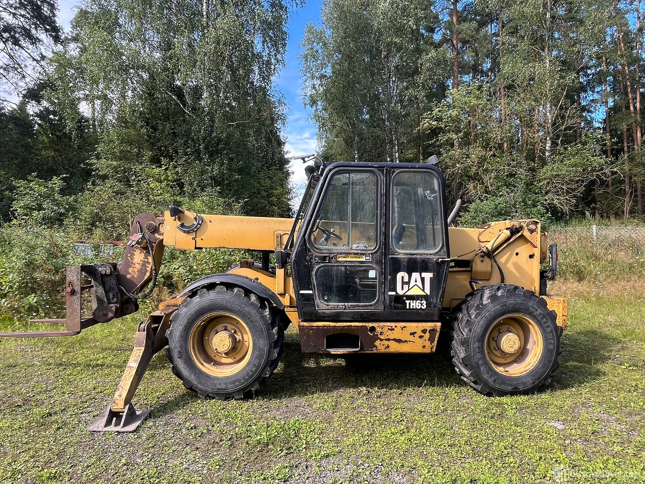 Caterpillar TH63, kurottaja piikeillä ja kauhalla, 2002, Loppi - Agricultural machinery: picture 3 Caterpillar TH63, kurottaja piikeillä ja kauhalla, 2002, Loppi - Agricultural machinery: picture 3