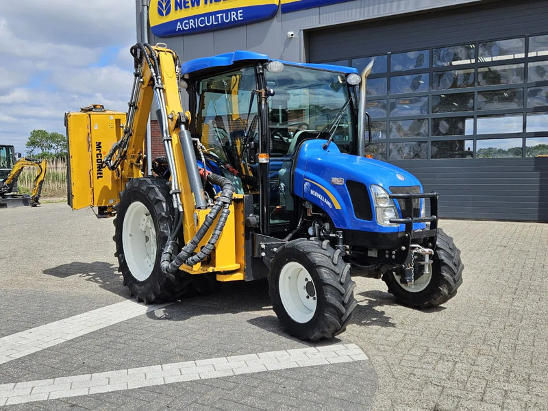 New Holland Boomer 3050 met Bos Maaiarm - Compact tractor: picture 1 New Holland Boomer 3050 met Bos Maaiarm - Compact tractor: picture 1