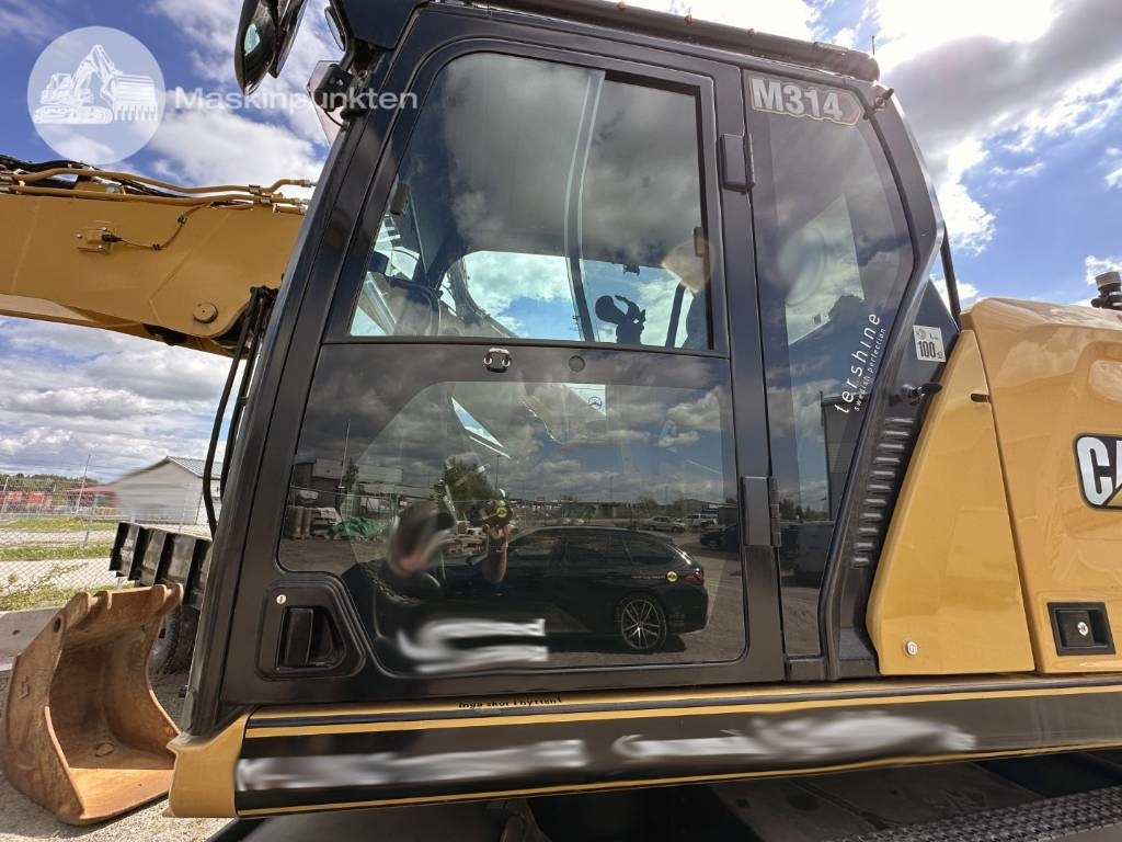 Wheel excavator CAT M 314: picture 11