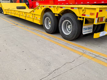 TITAN Rgn Lowboy Trailer for Sale in Zambia - Low loader semi-trailer: picture 2 TITAN Rgn Lowboy Trailer for Sale in Zambia - Low loader semi-trailer: picture 2