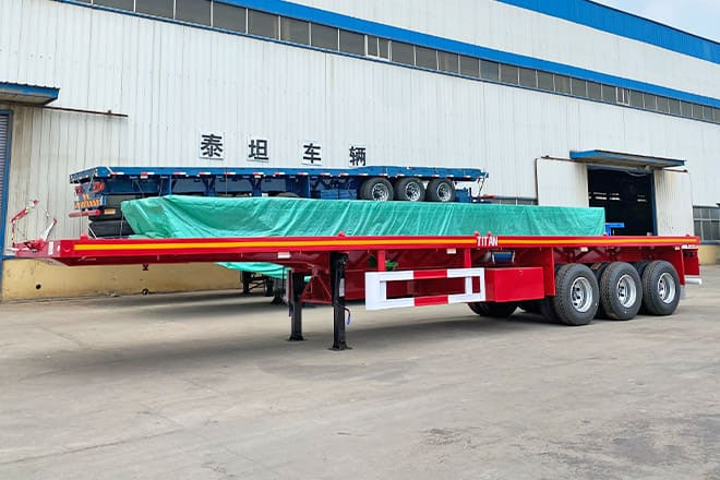 TITAN Tri Axle Flatbed Trailer for Sale Near Me in Nigeria - Dropside/ Flatbed semi-trailer: picture 1 TITAN Tri Axle Flatbed Trailer for Sale Near Me in Nigeria - Dropside/ Flatbed semi-trailer: picture 1