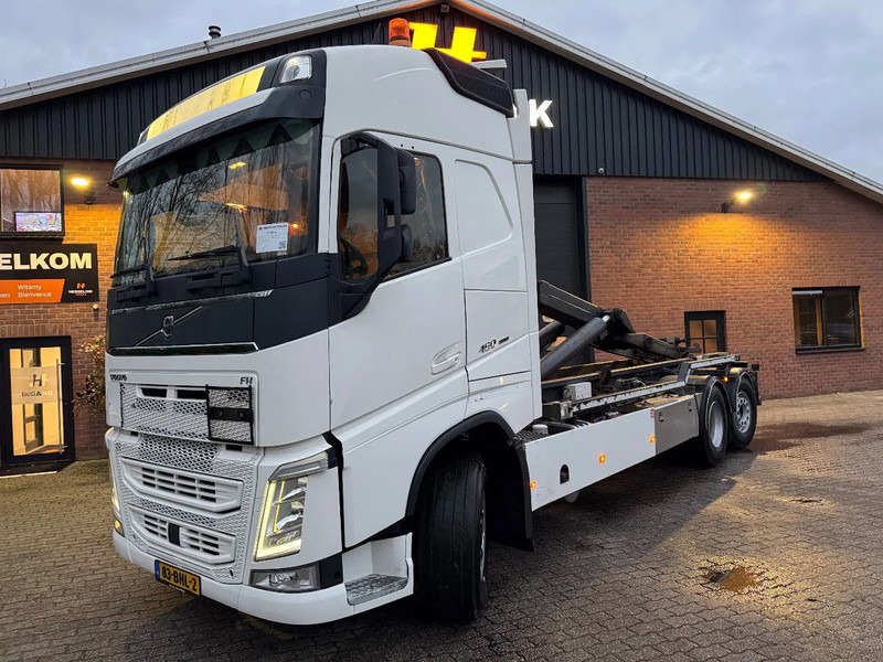 Volvo FH 6X2 VDL 25T Haakarm Standairco 9T Vooras Stuuras NL Truck - Hook lift truck: picture 1 Volvo FH 6X2 VDL 25T Haakarm Standairco 9T Vooras Stuuras NL Truck - Hook lift truck: picture 1
