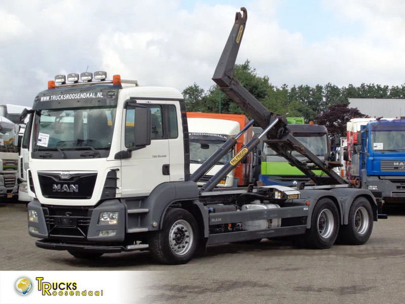 MAN TGS 33.440 + Manual + Hook system + Euro 6 + 6X4 + Discounted from 69.500,- - Hook lift truck: picture 1 MAN TGS 33.440 + Manual + Hook system + Euro 6 + 6X4 + Discounted from 69.500,- - Hook lift truck: picture 1