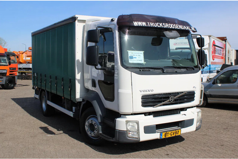 Volvo FL 12 .240 + LIFT + MANUAL - Curtain side truck: picture 2 Volvo FL 12 .240 + LIFT + MANUAL - Curtain side truck: picture 2
