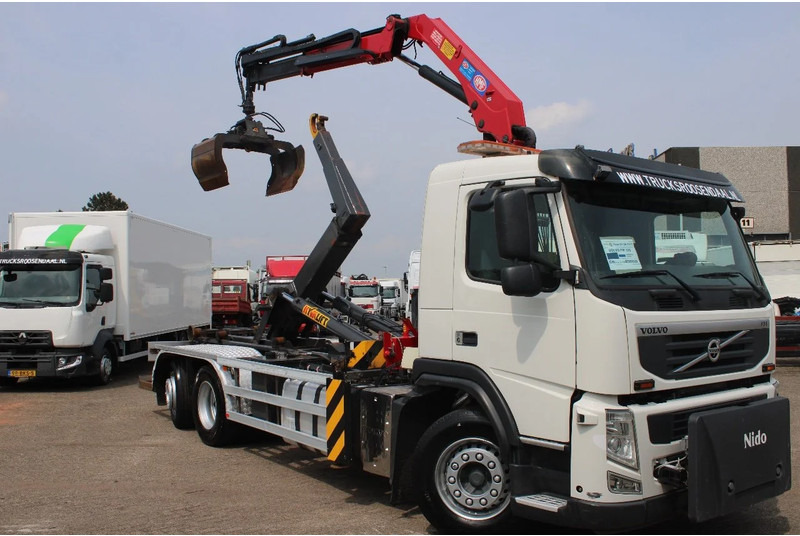 Volvo FM 330 + HMF 1035 + HOOKSYTEM HYVA + EURO 5 + 6X2 - Cable system truck, Crane truck: picture 2 Volvo FM 330 + HMF 1035 + HOOKSYTEM HYVA + EURO 5 + 6X2 - Cable system truck, Crane truck: picture 2