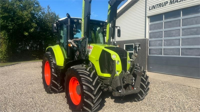 Farm tractor Claas ARION 550 CEBIS Med frontlæsser og frontlift: picture 15
