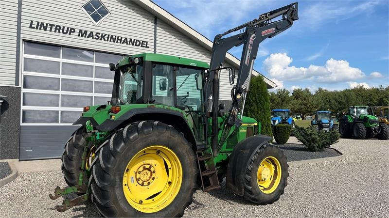 Farm tractor John Deere 6910 Auto Quad II-TLS Med frontlæsser: picture 11