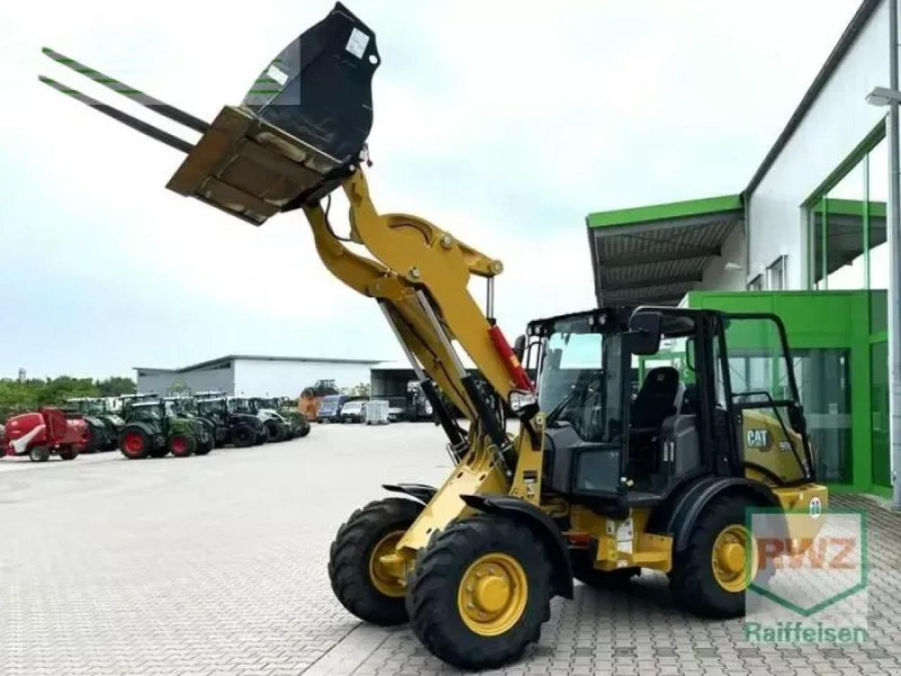 Caterpillar 906 radlader - Mini excavator: picture 1 Caterpillar 906 radlader - Mini excavator: picture 1