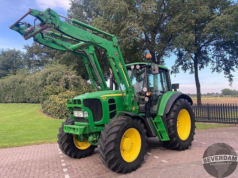 Farm tractor John Deere 6530 Premium: picture 1