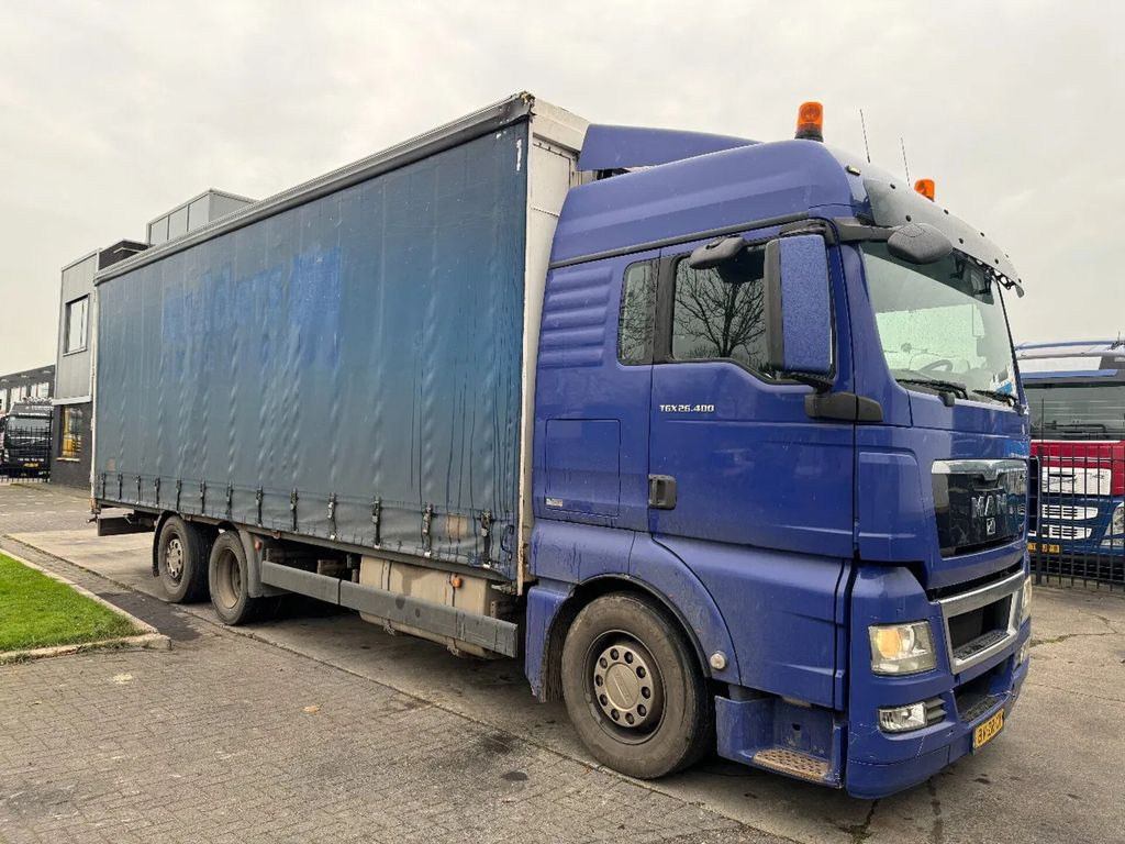MAN TGX 26.400 6X2 - EURO 4 + LIFT + STEERING AXLE + - Curtain side truck: picture 3 MAN TGX 26.400 6X2 - EURO 4 + LIFT + STEERING AXLE + - Curtain side truck: picture 3