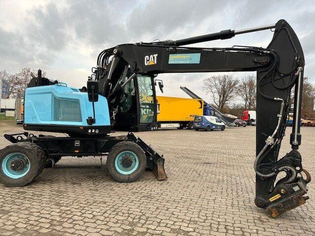 Caterpillar M315F, OilQuick, Hammer- u- Greifersteuerung - Wheel excavator: picture 2 Caterpillar M315F, OilQuick, Hammer- u- Greifersteuerung - Wheel excavator: picture 2