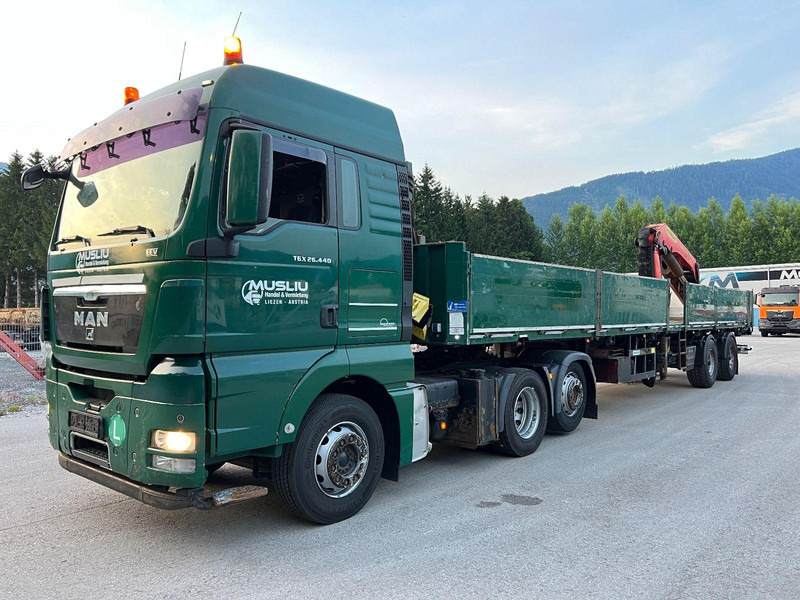 MAN TGX 26.440 6x2 + Flatbed semi trailer + Crane PK26002 - Tractor truck: picture 1 MAN TGX 26.440 6x2 + Flatbed semi trailer + Crane PK26002 - Tractor truck: picture 1